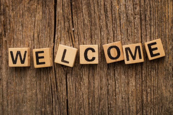 toy-bricks-table-with-word-welcome